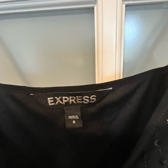 Elegant Black Sleeveless Jumpsuit - Picture 3 of 5